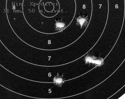  Toz 78 pienoiskiv��rin kasa avot�ht�imill�, Winchester Xpediter .22LR, kasan koko 22 mm/50 m 